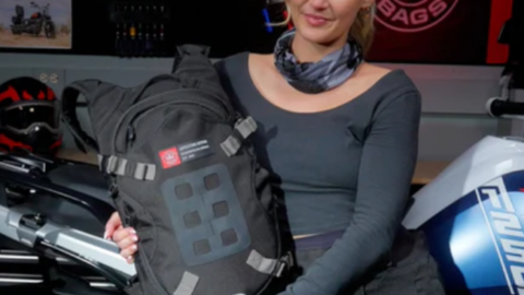 Woman holding Viking Backpack